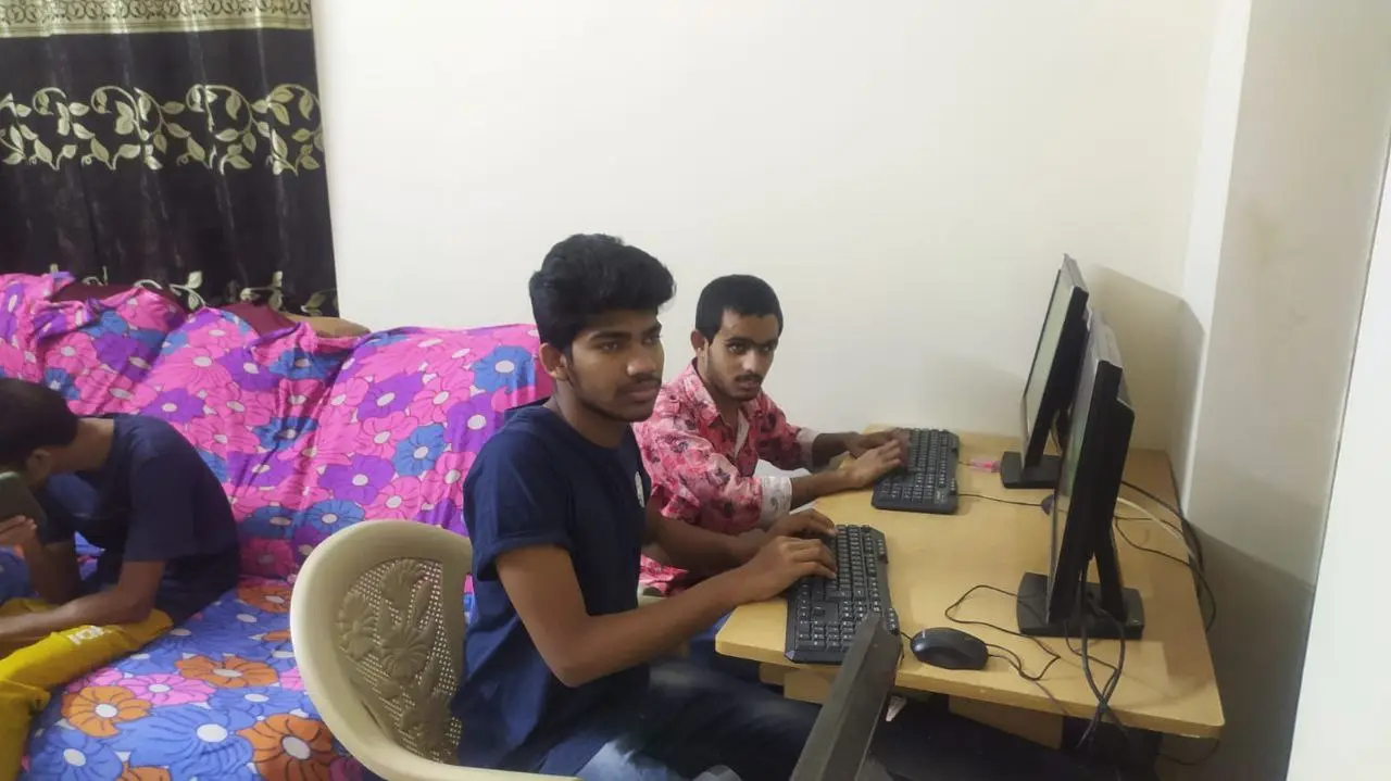 Students learning computer skills at the home — a step towards work and higher study