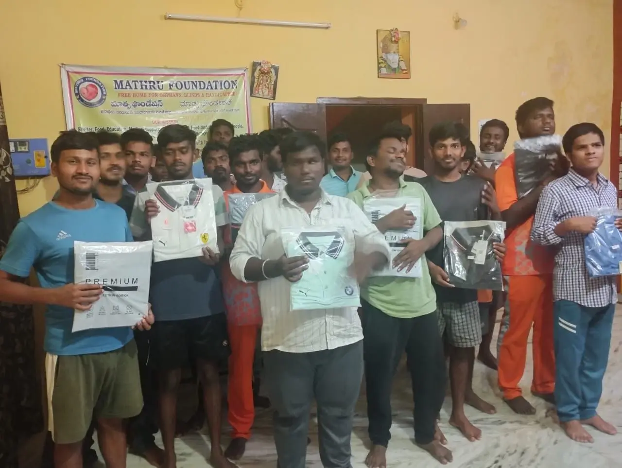 Residents with clothing donated to the home
